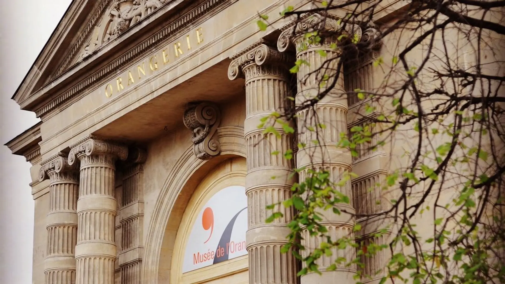 The Musee De L'Orangerie building with golden text saying: ORANGERIE.